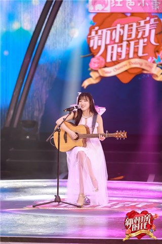 谭阳洋甜美弹唱