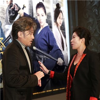(DMG印纪传媒董事长吴冰女士与吴秀波)